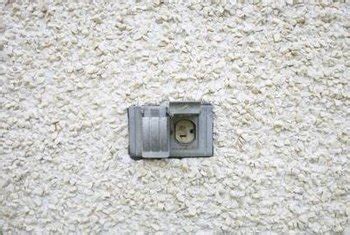 install junction box on stucco|plug in electrical through stucco.